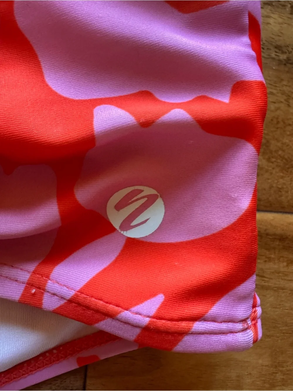 Nani Swimwear Pink and Red Abstract Sports Swim Top